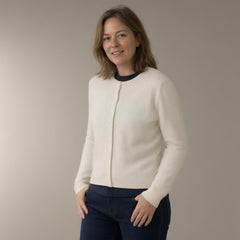 Woman wearing the button-front knit cardigan, full length, studio