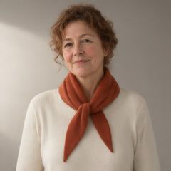 Woman wearing the slim knitted wool scarf, triangle tie, full length, studio