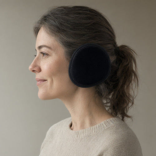 Woman wearing the behind-the-head ear warmers, plush lined, full length, studio