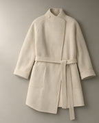 Women’s Belted Mandarin Collar Wool Coat, laid flat on a stone backdrop