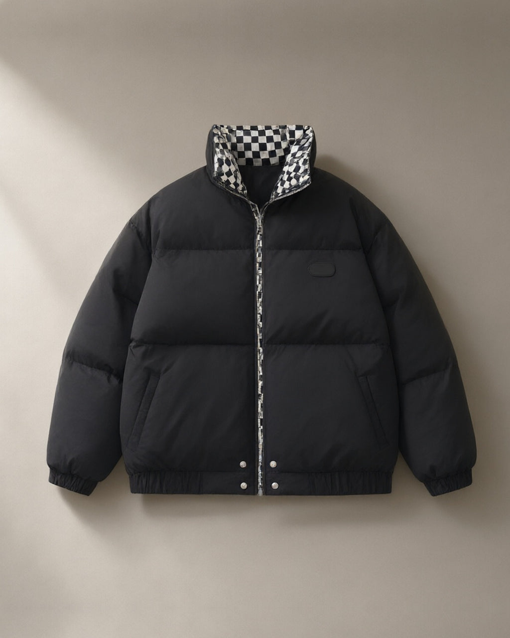 Women’s Contrast-Collar Short Puffer Jacket, laid flat on a stone backdrop