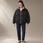 Woman wearing the contrast-collar short puffer jacket, full length, studio