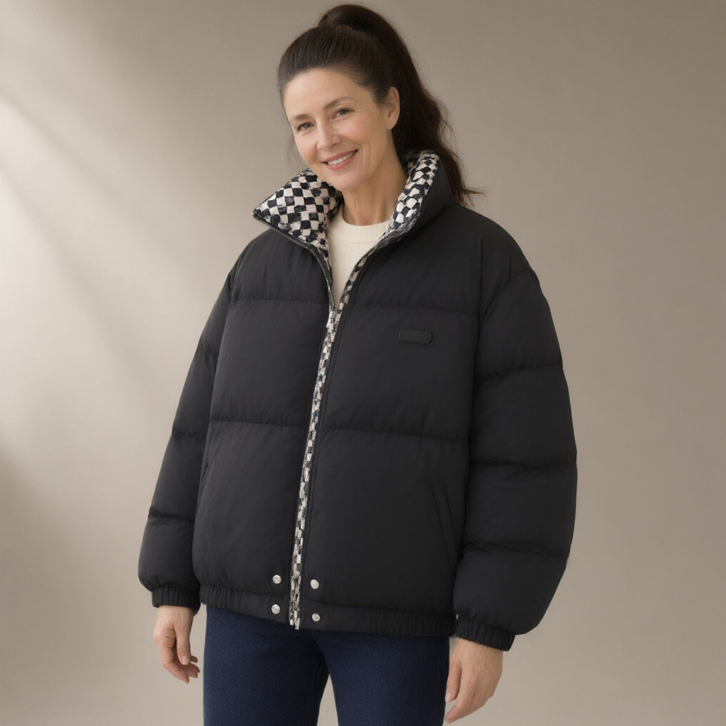 Woman wearing the contrast-collar short puffer jacket, three-quarter view, studio