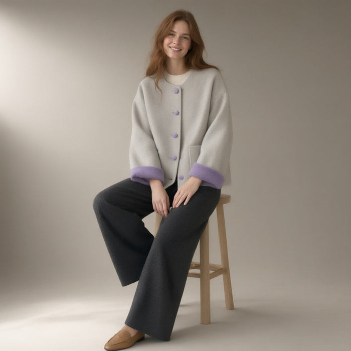 Woman wearing the double-faced wool jacket, round neck, full length, studio