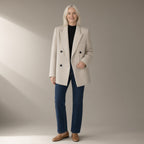 Woman wearing the double-breasted wool coat, 70% wool, full length, studio