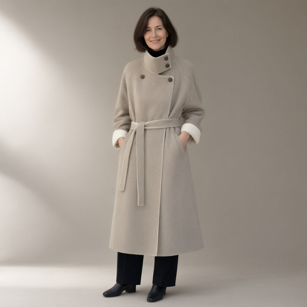Woman wearing the belted double-faced swing coat, funnel collar, full length, studio