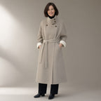 Woman wearing the belted double-faced swing coat, funnel collar, full length, studio