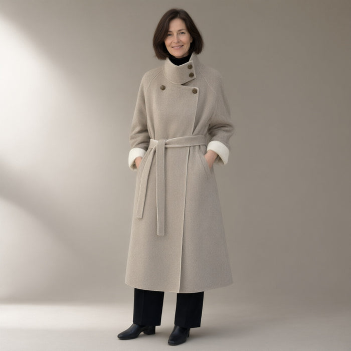 Woman wearing the belted double-faced swing coat, funnel collar, full length, studio