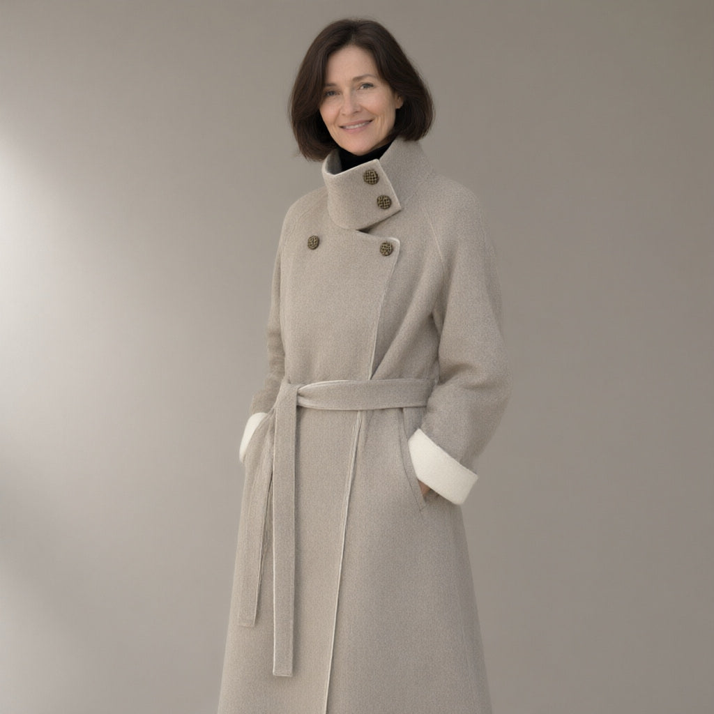 Woman wearing the belted double-faced swing coat, funnel collar, three-quarter view, studio