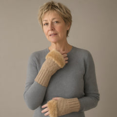 Woman wearing the fingerless mittens, faux fur cuff, full length, studio