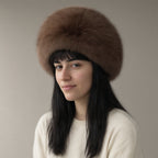 Woman wearing the faux fur cossack hat, full length, studio