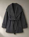 Women’s Belted Wrap Coat, Oversized Fold Collar, laid flat on a stone backdrop