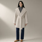 Woman wearing the hooded belted wool coat, double-faced – off-white, full length, studio