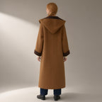 Woman seen from behind wearing the hooded colour-block wool coat, double-faced, back view