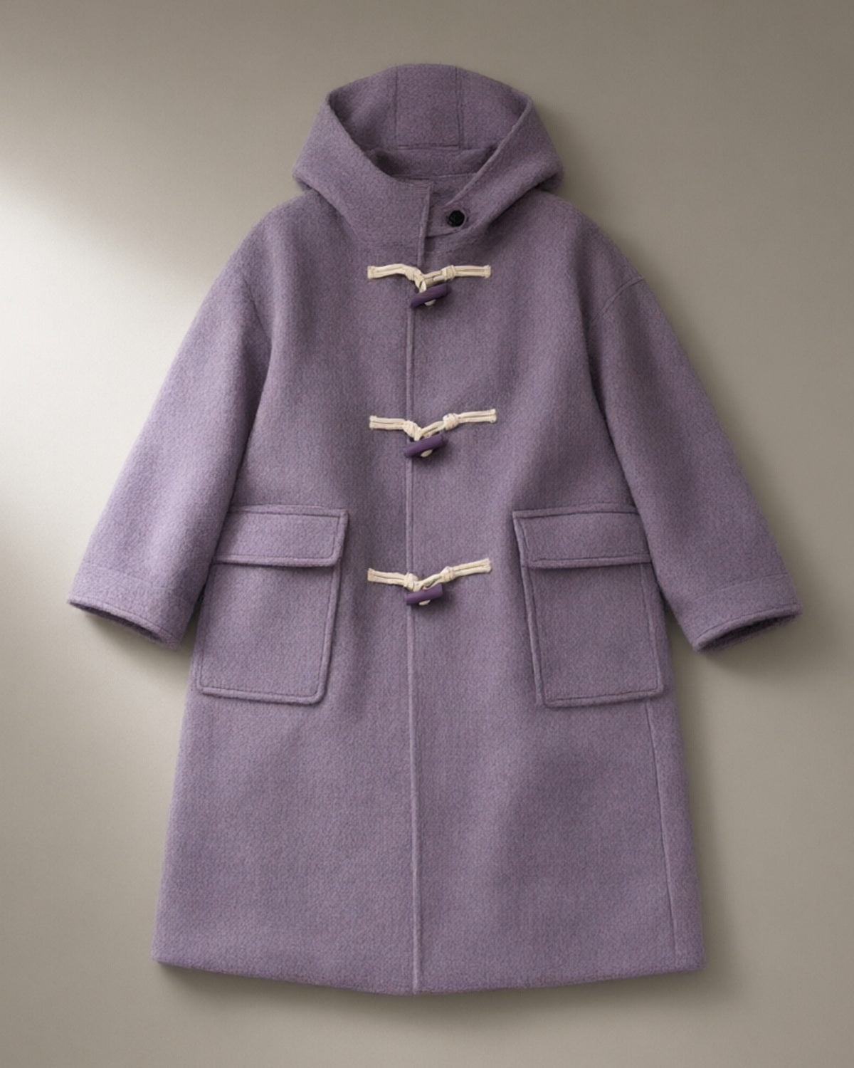 Women’s Hooded Duffle Coat, Toggle Fasten, Double-Faced Wool Blend, laid flat on a stone backdrop