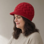 Woman wearing the knit brim beret, three-quarter view, studio