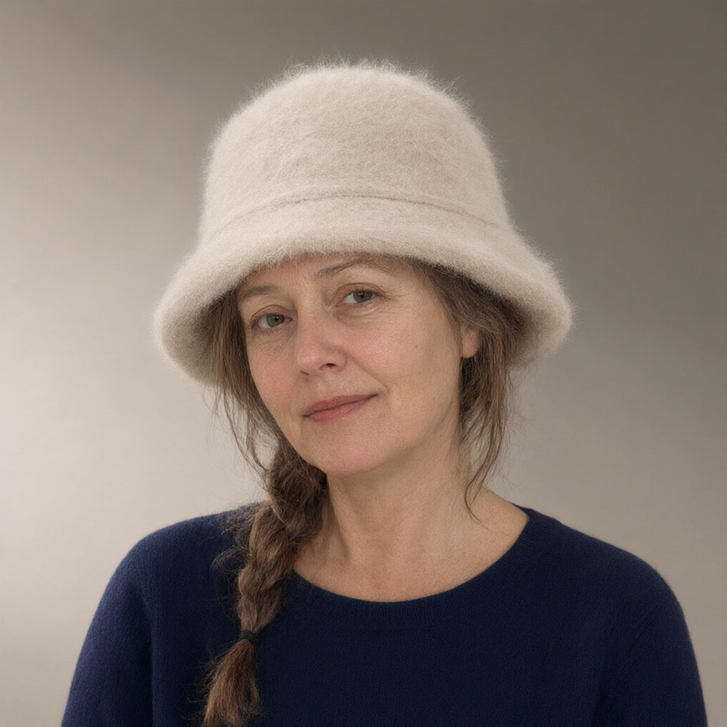 Woman wearing the knit fluffy bucket hat, full length, studio
