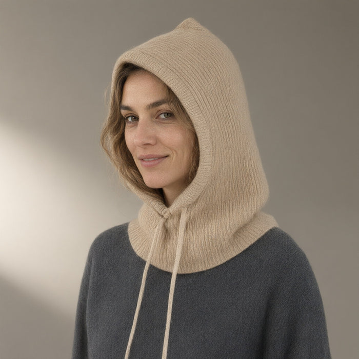 Woman wearing the knitted hood, drawstring neck, full length, studio