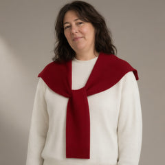 Woman wearing the knitted pull-through collar wrap, full length, studio