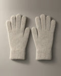 Women’s Knitted Stretch Gloves, Wrist-Length, laid flat on a stone backdrop