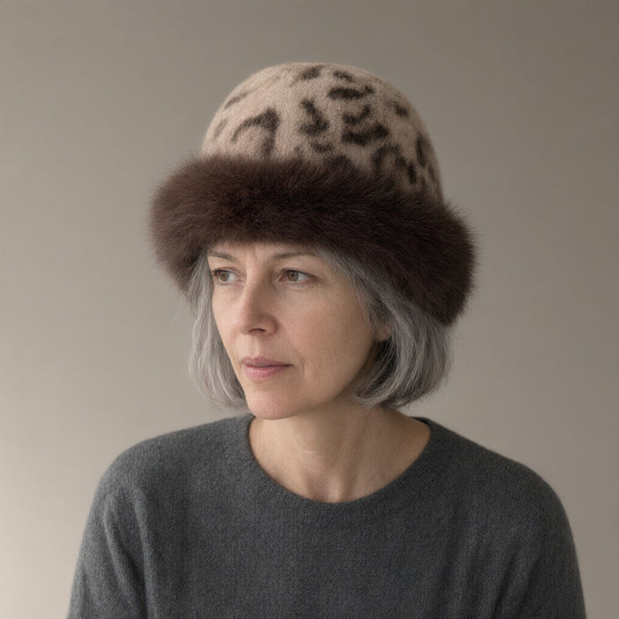 Woman wearing the faux fur trapper hat, leopard print, full length, studio