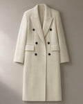 Women’s Long Double-Breasted Wool Coat, Wide Lapel, laid flat on a stone backdrop