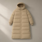 Women’s Long Hooded Puffer Coat, Over the Knee, laid flat on a stone backdrop