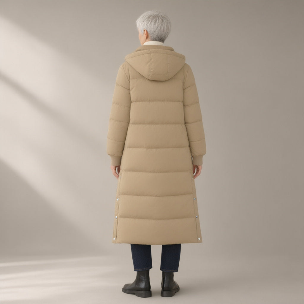 Woman seen from behind wearing the long hooded puffer coat, over the knee, back view