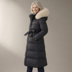 Woman wearing the long puffer coat, detachable faux fur collar, three-quarter view, studio