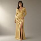 Woman wearing the long-sleeve satin prom dress, wrap slit – gold, full length, studio