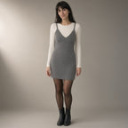 Woman wearing the merino-blend knit camisole dress, full length, studio