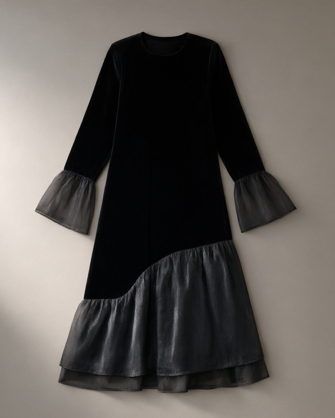 Women’s Mesh Hem Velvet Midi Dress, Flared Sleeve – Black, laid flat on a stone backdrop