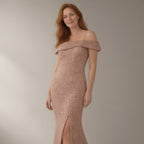 Woman wearing the one-shoulder sequin mermaid evening gown – rose gold, three-quarter view, studio