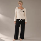 Woman wearing the ribbed knit lounge set, full length, studio