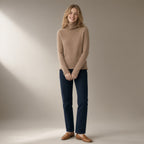 Woman wearing the roll neck wool jumper, 100% wool, full length, studio
