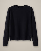 Women’s Wool Jumper, Round Neck, 100% Wool, laid flat on a stone backdrop