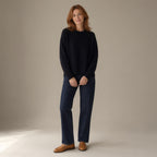 Woman wearing the wool jumper, round neck, 100% wool, full length, studio