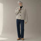 Woman wearing the shirt collar wool jacket, single-breasted, full length, studio