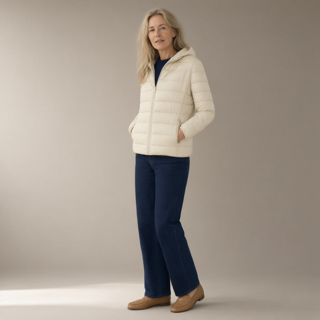 Woman wearing the short hooded down jacket – 90% duck down, full length, studio