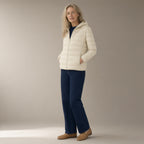 Woman wearing the short hooded down jacket – 90% duck down, full length, studio