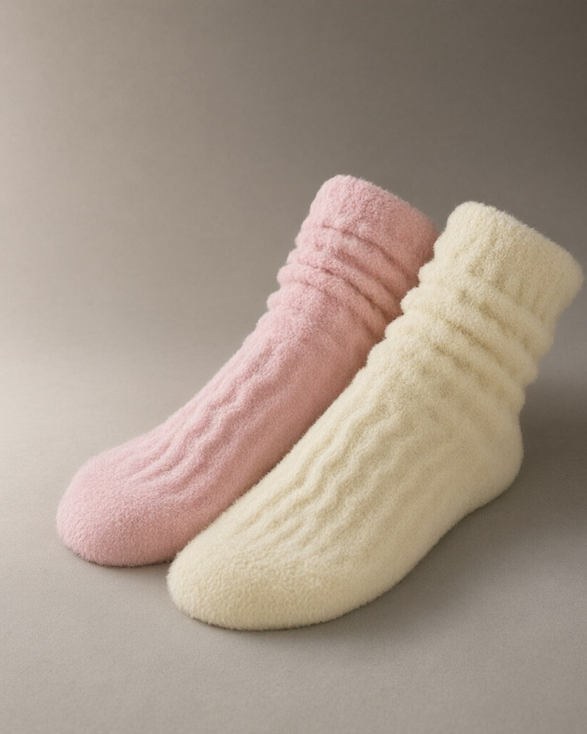 Women’s Fluffy Bed Socks — 2 Pairs, laid flat on a stone backdrop