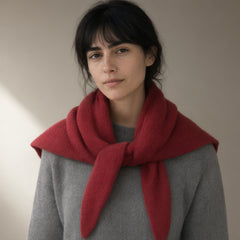 Woman wearing the striped knit triangle scarf, full length, studio