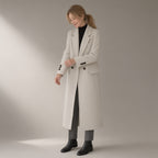 Woman wearing the wool blend coat, 70% wool double-faced, three-quarter view, studio