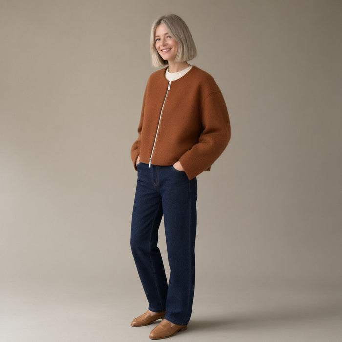 Woman wearing the zip-front cropped wool jacket, round neck, full length, studio